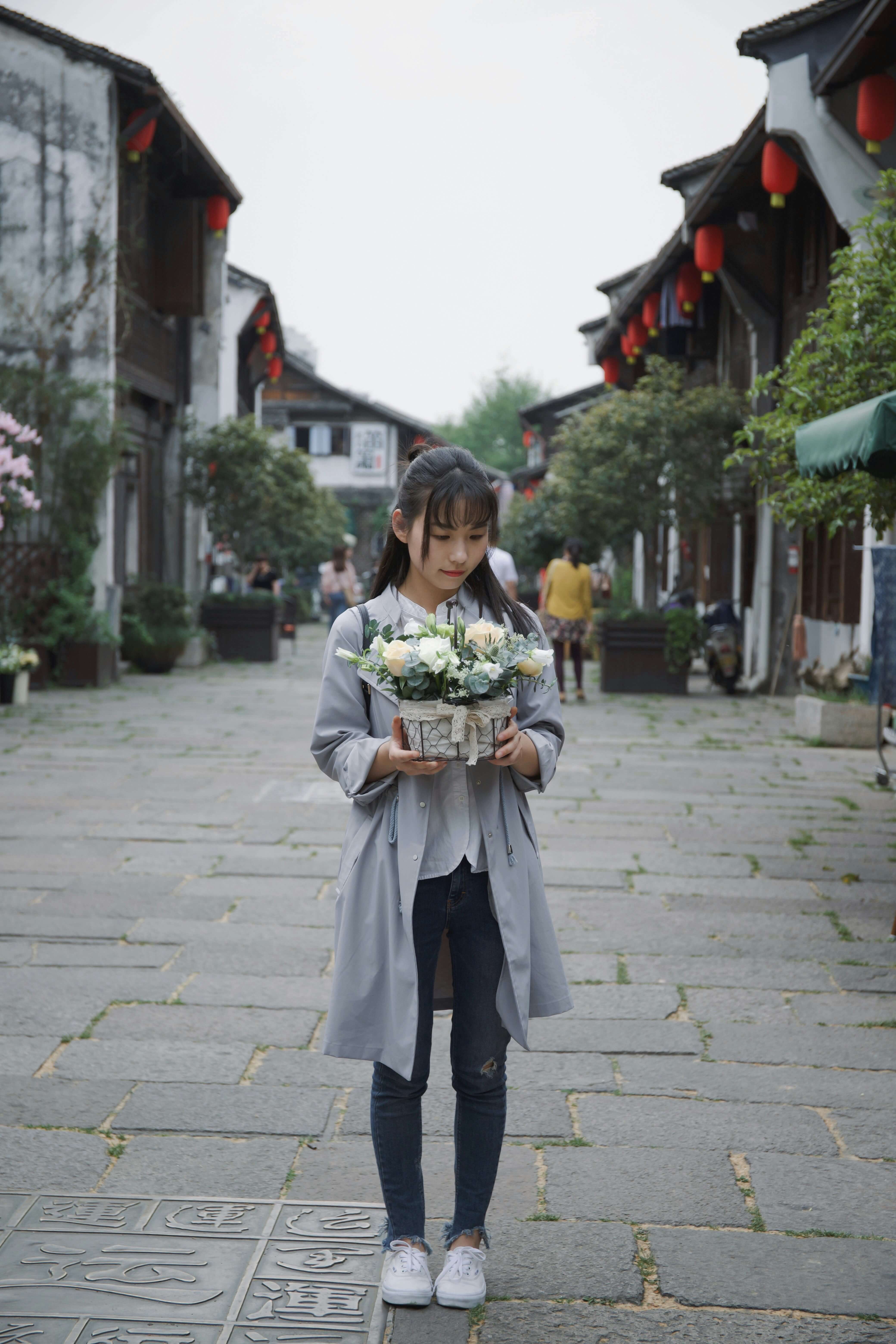 Woman holding flowers